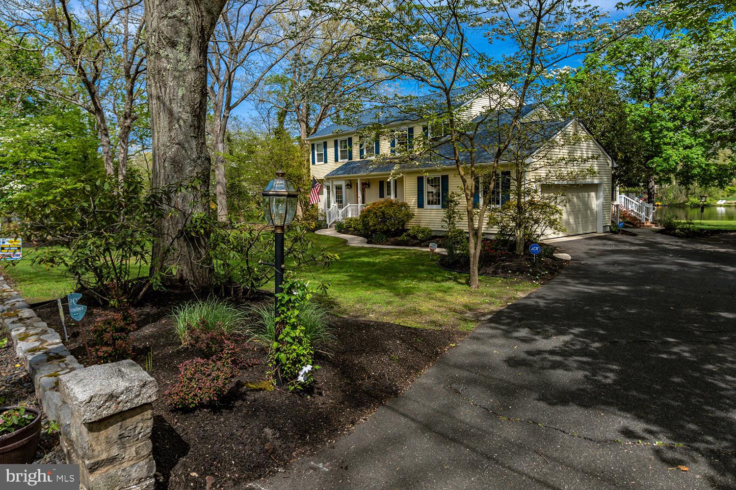 14 West Lake Avenue Medford, NJ 08055 - Photo 3 of 37 View of side-entry garage from main driveway