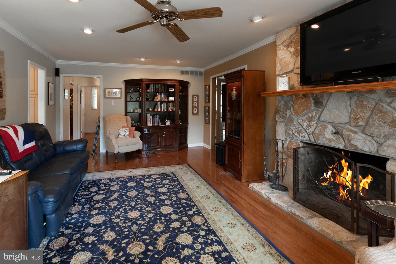 14 West Lake Avenue Medford, NJ 08055 - Photo 9 of 37 Cozy family room with lovely stone fireplace