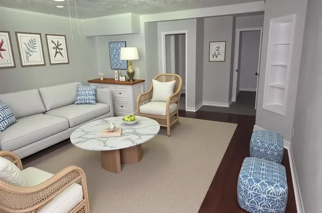 a living room with furniture and a table