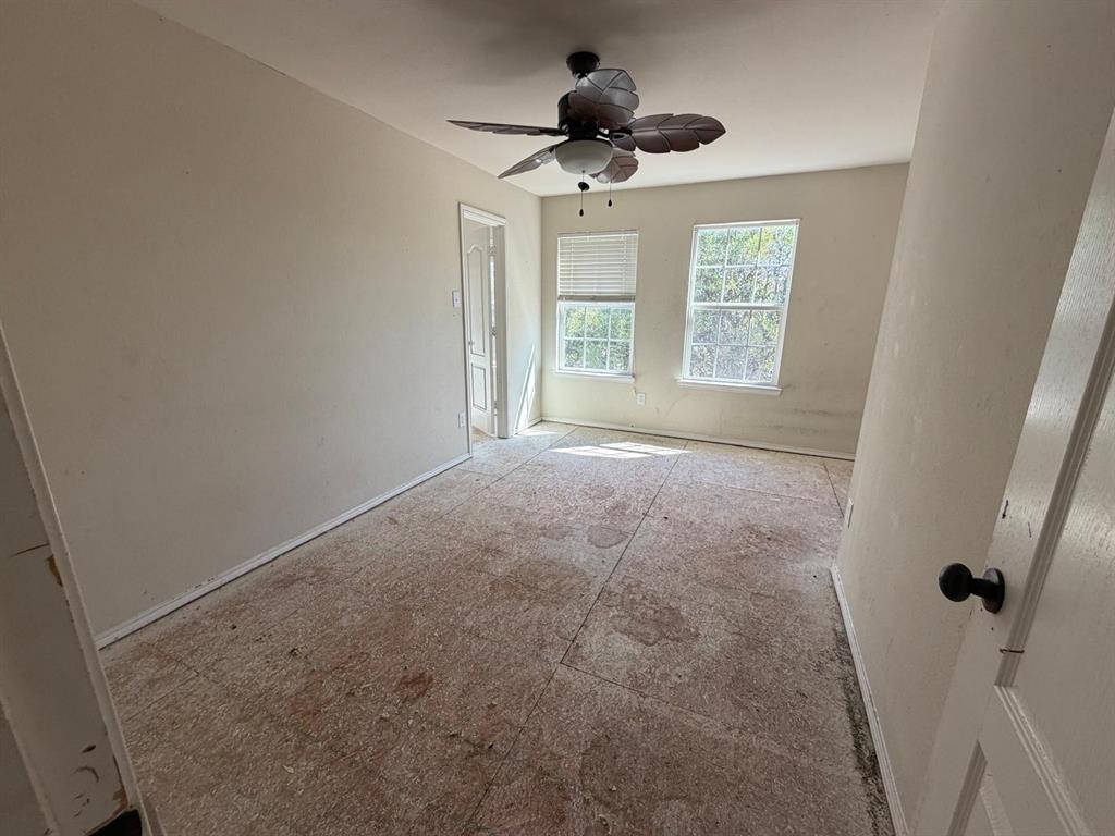 10400 Wagon Rut Court Fort Worth, TX 76108 - Photo 21 of 26 Unfurnished room featuring a ceiling fan
