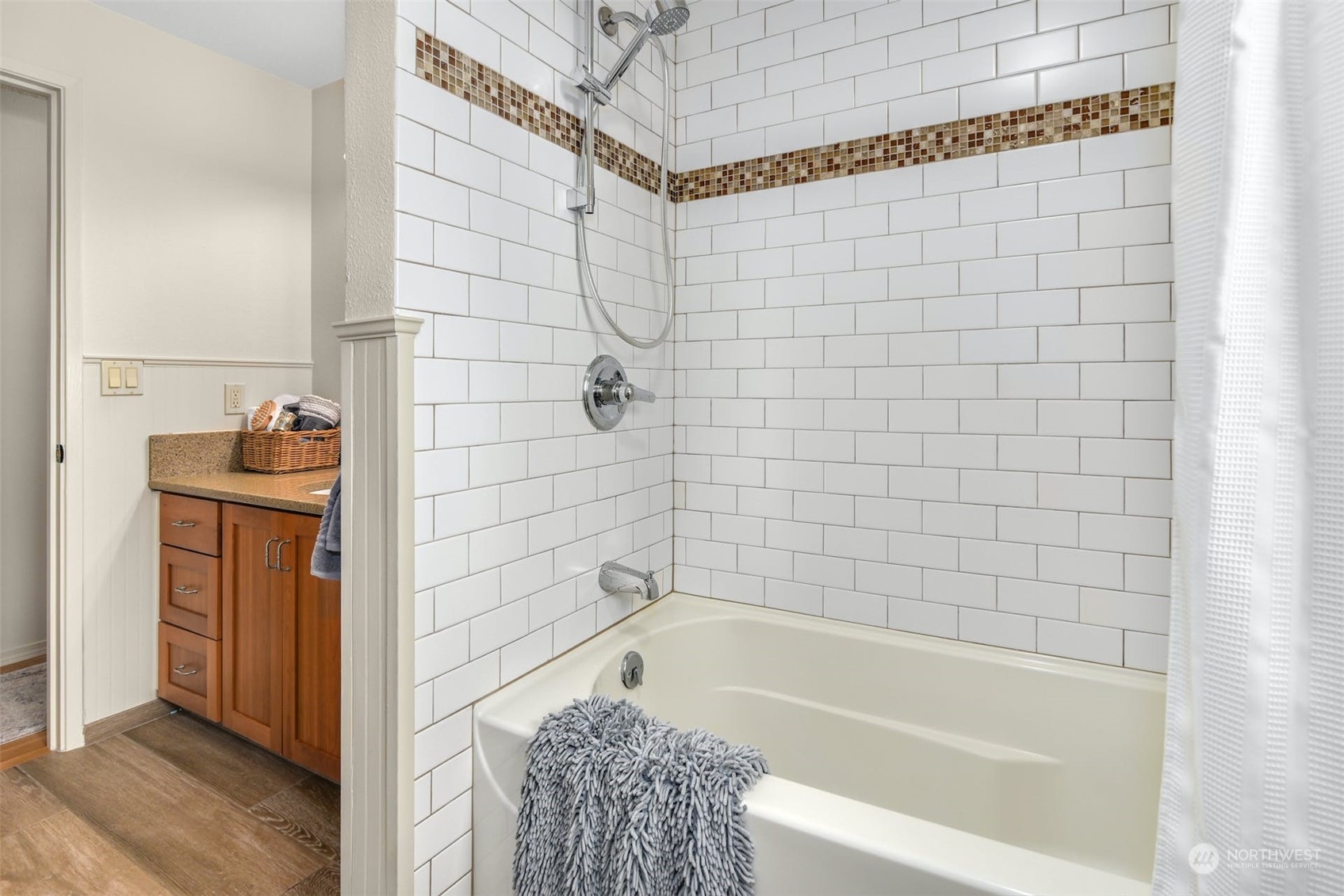 823 South 28th Court Renton, WA 98055 - Photo 12 of 37 a bathroom with a bathtub and shower