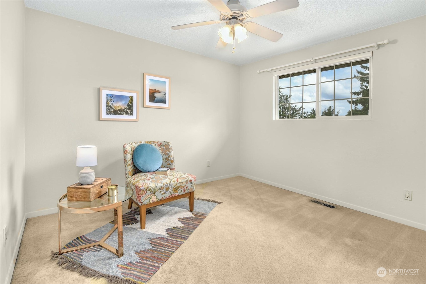 823 South 28th Court Renton, WA 98055 - Photo 13 of 37 a living room with furniture and a window