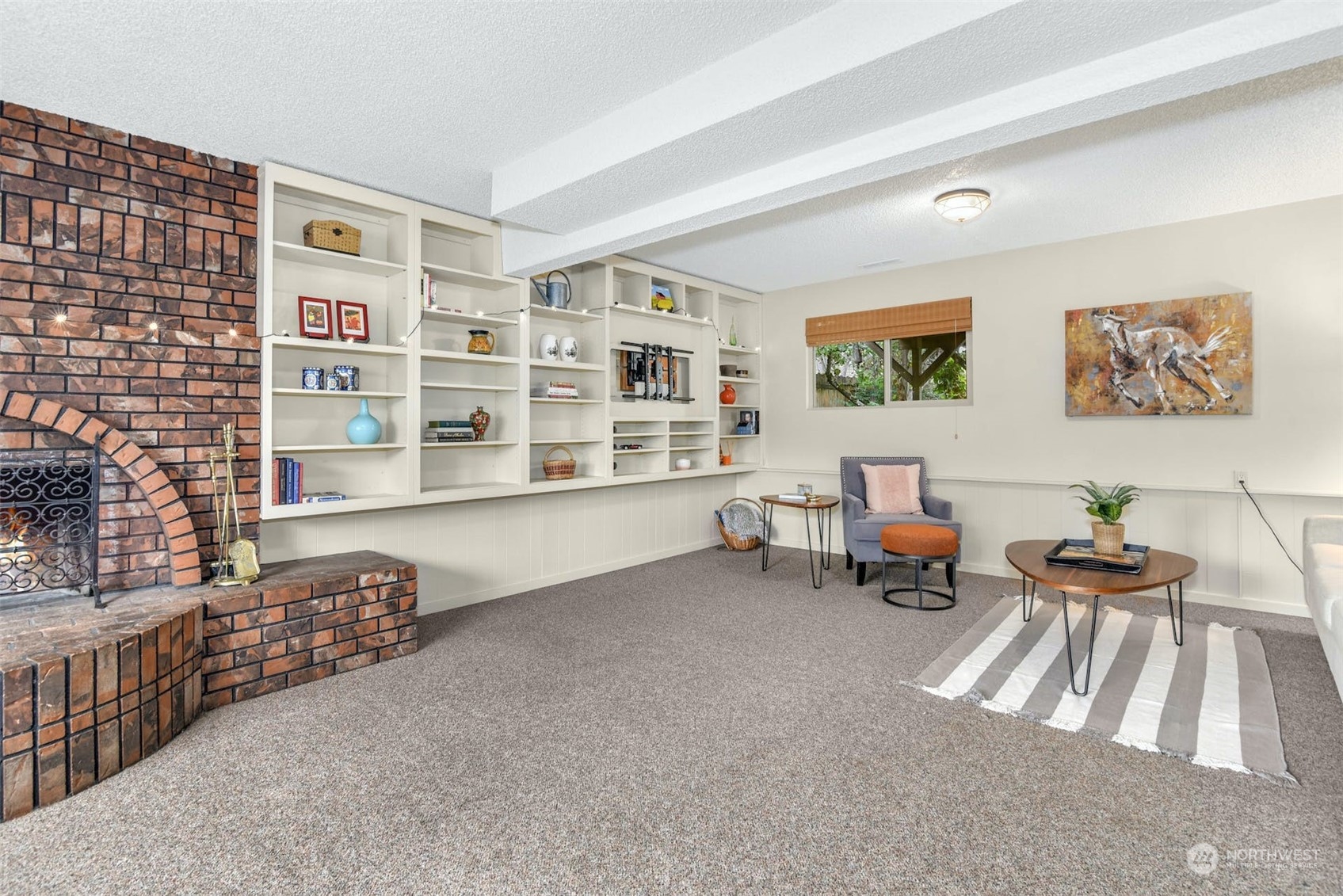 823 South 28th Court Renton, WA 98055 - Photo 19 of 37 a reading room with furniture and book shelf