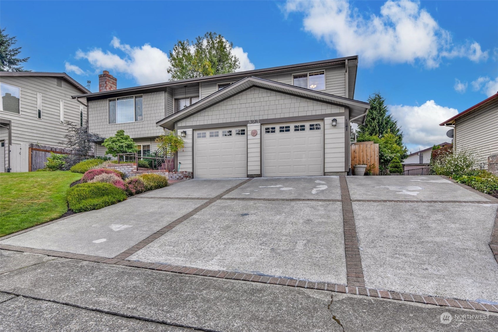 823 South 28th Court Renton, WA 98055 - Photo 2 of 37 a view of a house with a yard