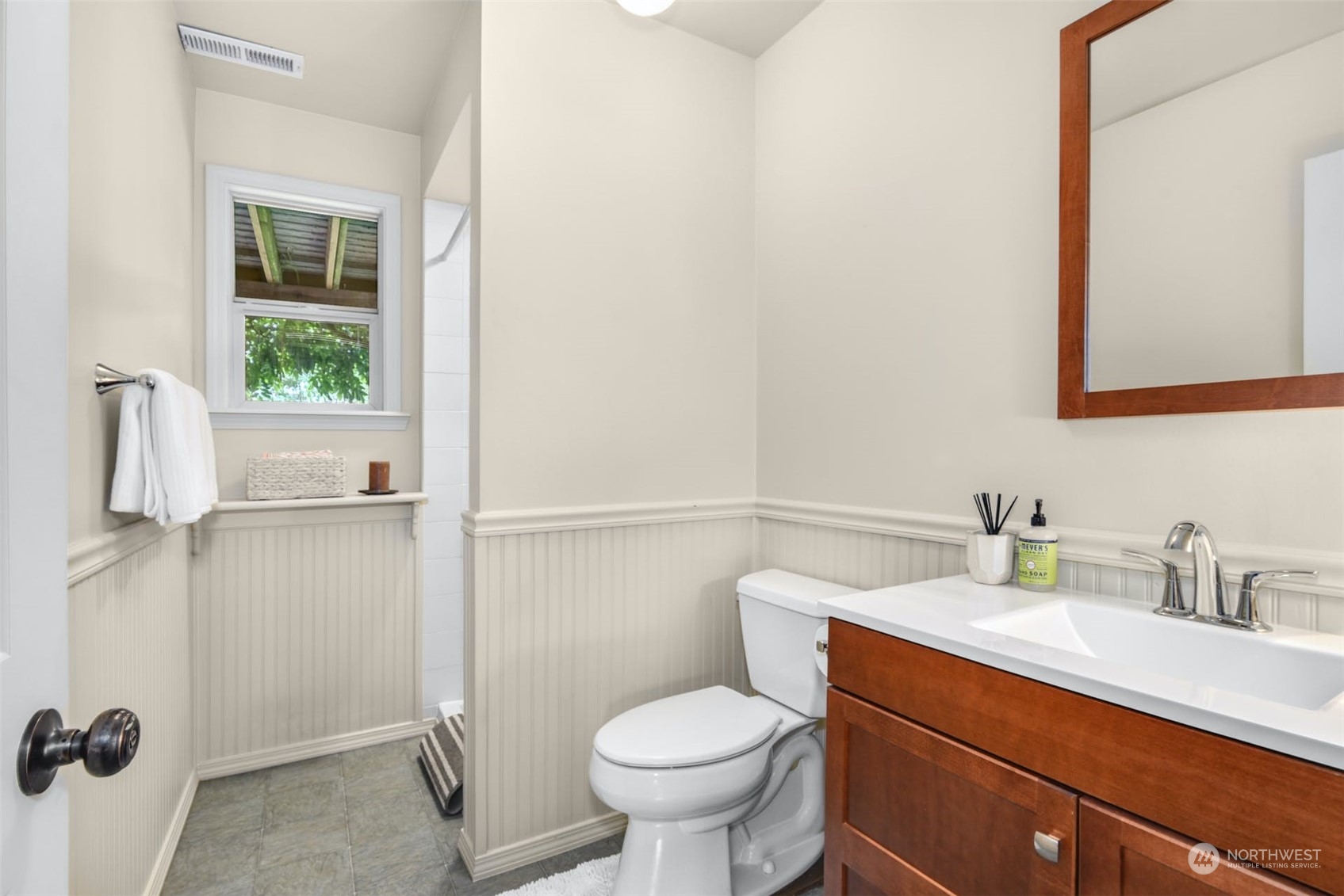 823 South 28th Court Renton, WA 98055 - Photo 21 of 37 a bathroom with a toilet sink and mirror