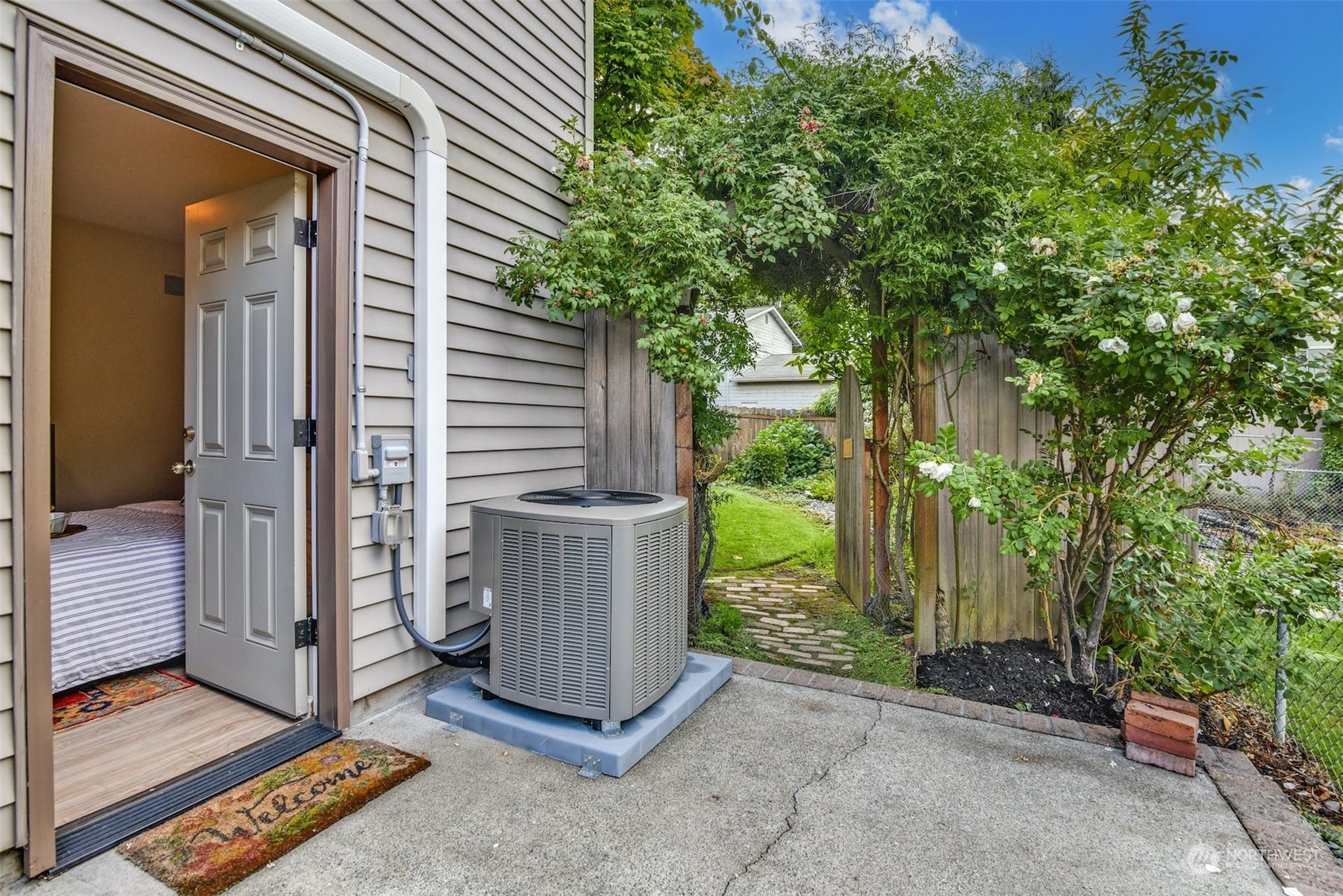 823 South 28th Court Renton, WA 98055 - Photo 26 of 37 a view of a porch with a door and wooden fence