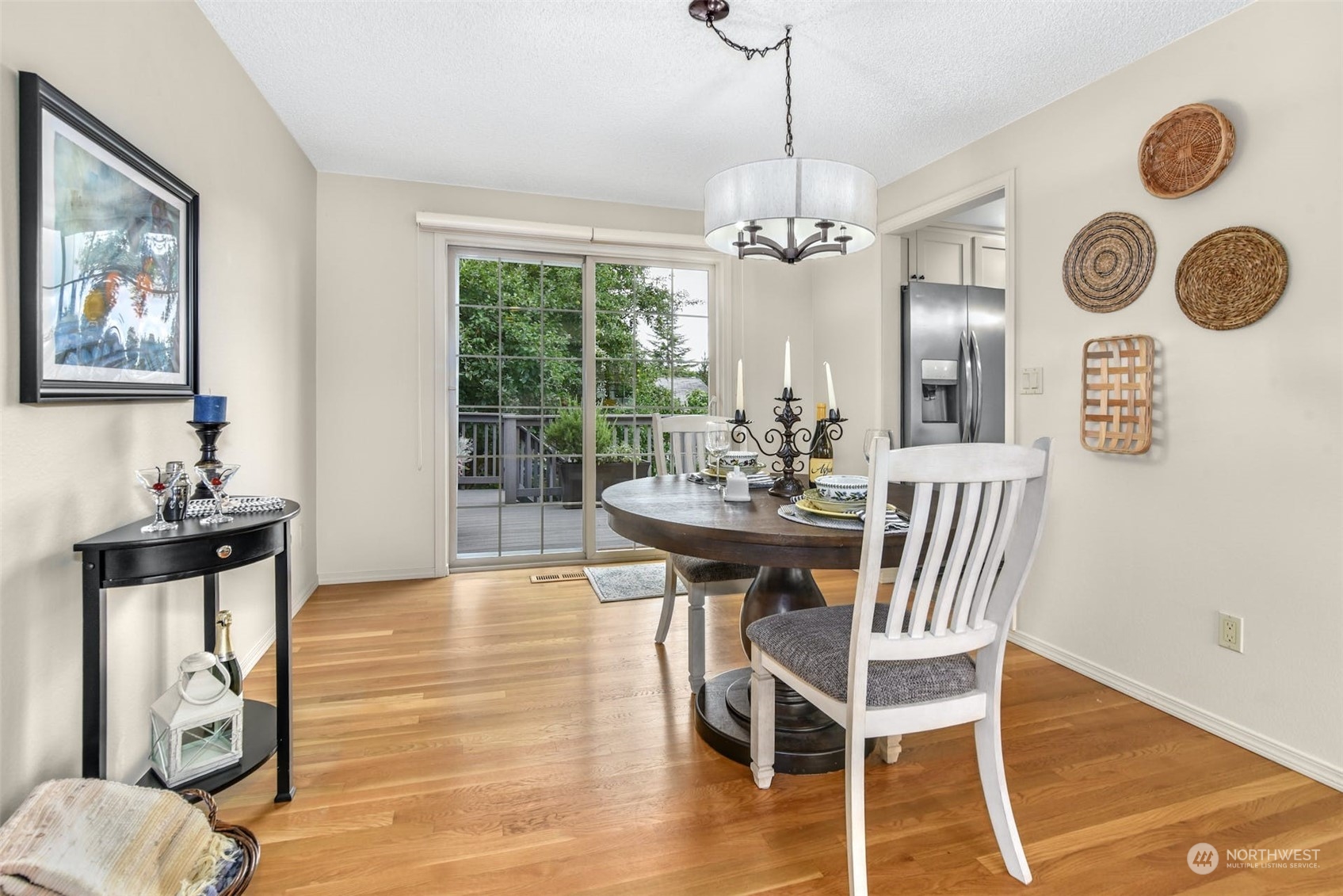 823 South 28th Court Renton, WA 98055 - Photo 6 of 37 a view of a dining room with furniture and chandelier