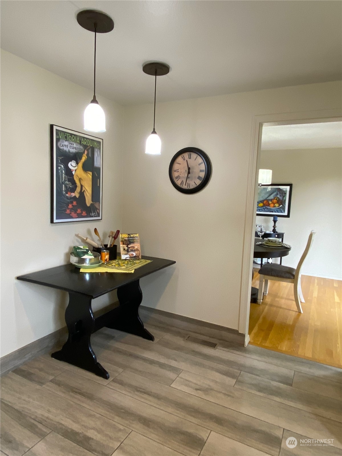 823 South 28th Court Renton, WA 98055 - Photo 9 of 37 a view of a dining room with furniture wooden floor and chandelier