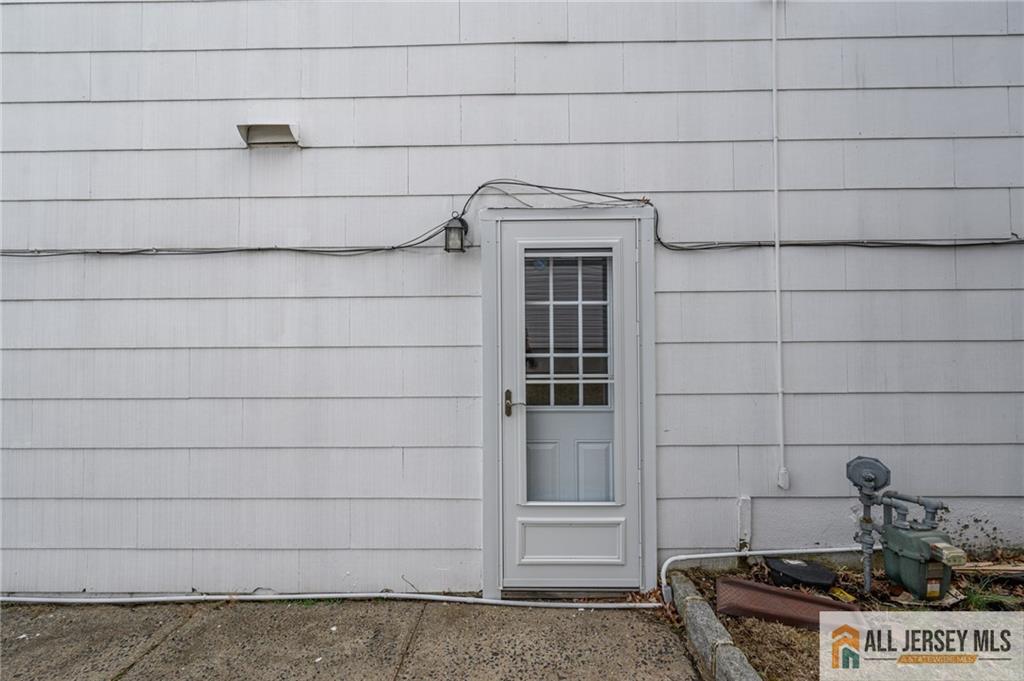 691 Inman Avenue Colonia, NJ 07067 - Photo 3 of 32 a bathroom with a sink