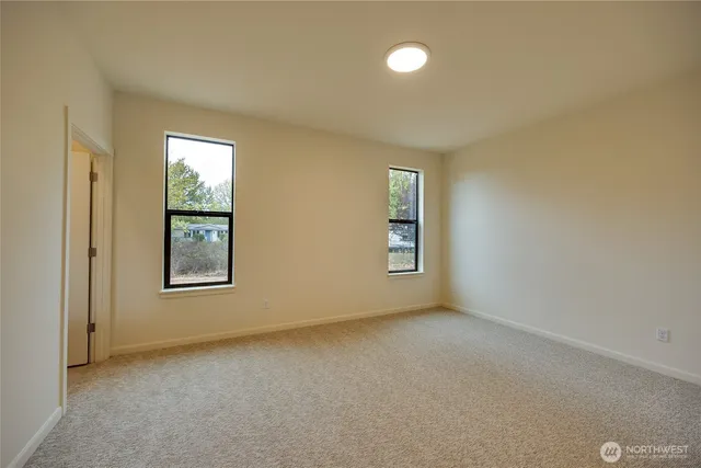 an empty room with windows