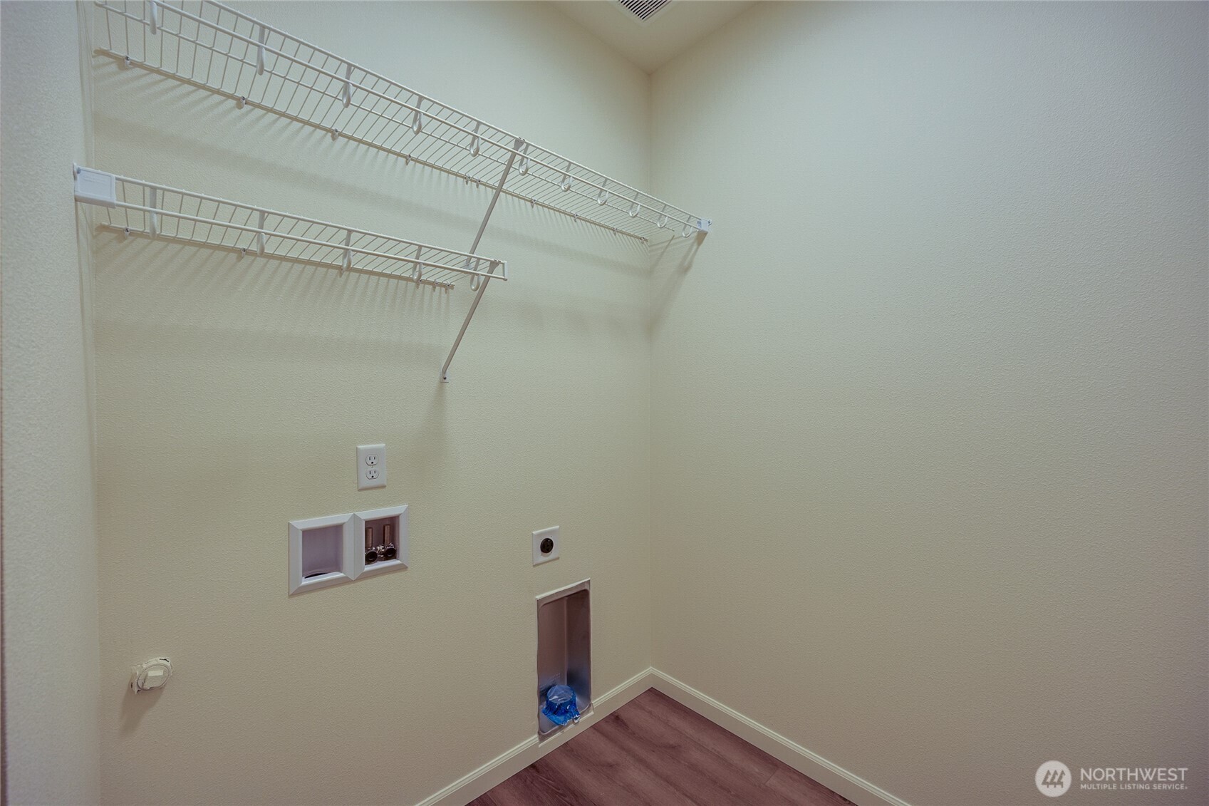 950 RW Fletcher Street Winlock, WA 98596 - Photo 32 of 40 a view of a room with wooden floor