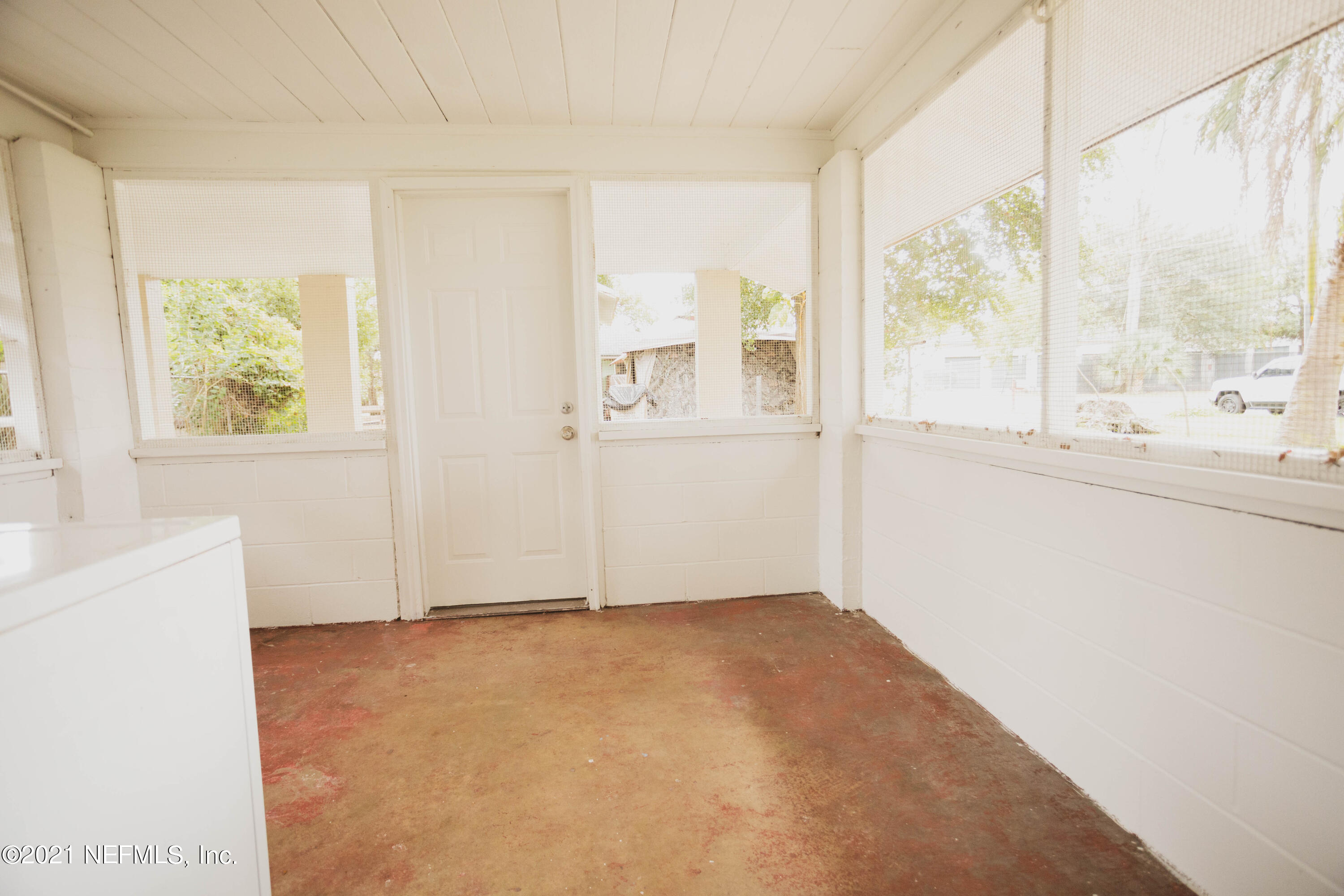 4447 Manchester Road Jacksonville, FL 32210 - Photo 16 of 19 Screened Porch/ Laundry