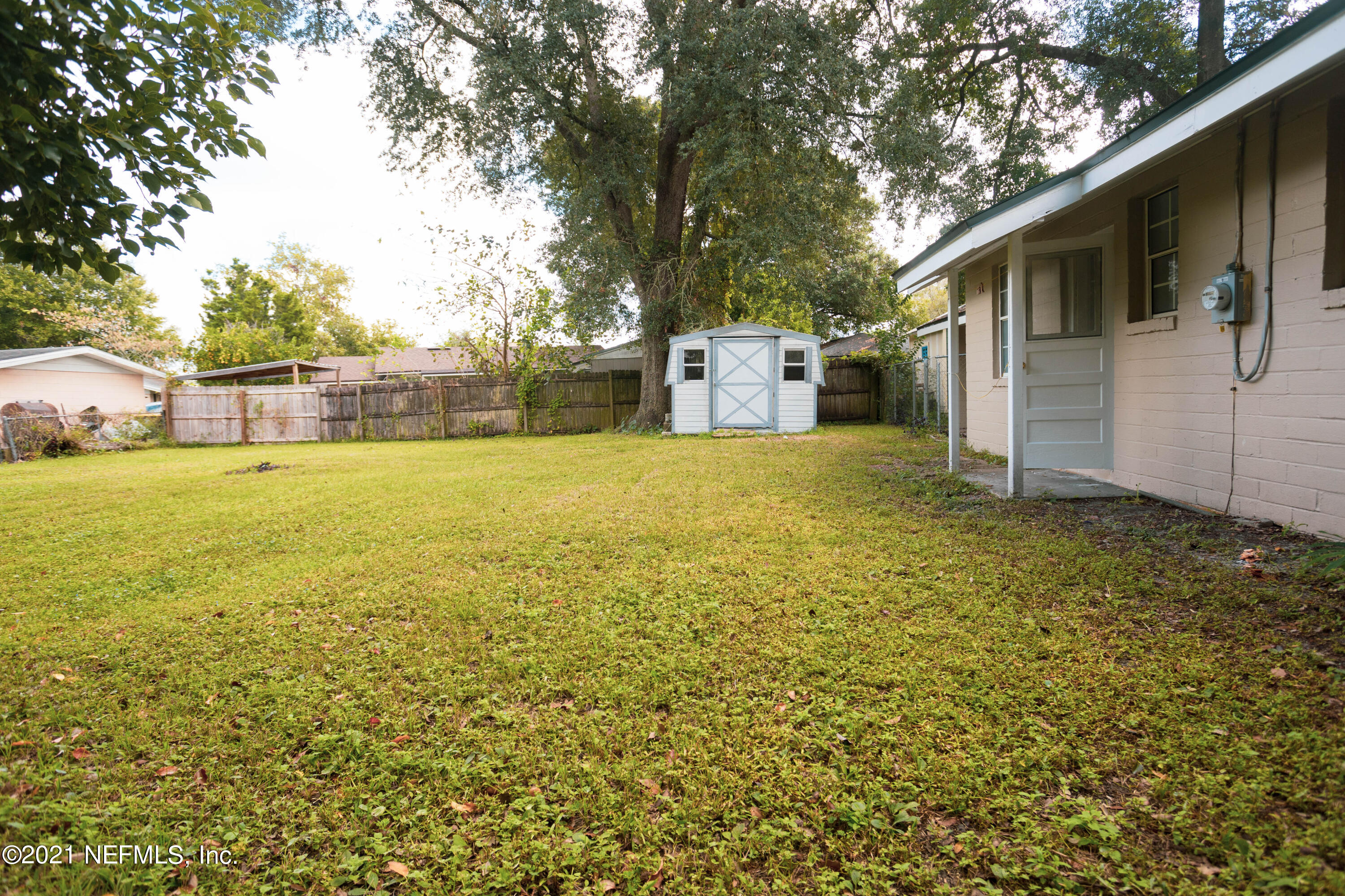 4447 Manchester Road Jacksonville, FL 32210 - Photo 17 of 19 Backyard w Shed