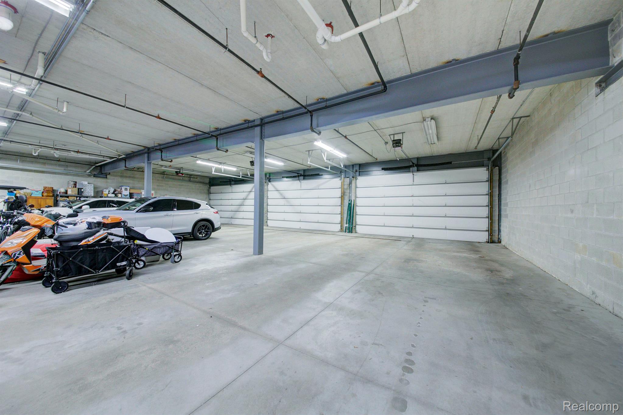 714 North Main Street, Unit 311 Rochester, MI 48307 - Photo 37 of 59 HUGE HEATED GARAGE