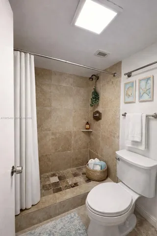 a view of a backyard with a sitting area