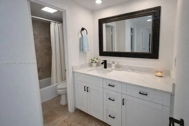 a view of lobby with a chandelier and living room