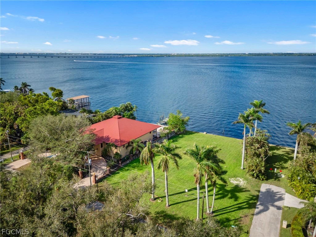3508 Stuart Court Fort Myers, FL 33901 - Photo 20 of 23 a view of a lake with a garden