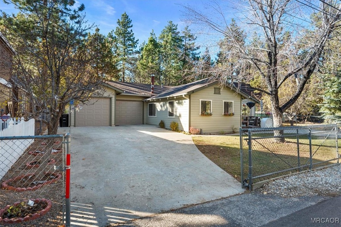 446 Moreno Lane Sugarloaf, CA 92386 - Photo 2 of 41 a view of a house with backyard and a tree