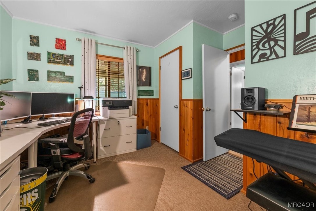 446 Moreno Lane Sugarloaf, CA 92386 - Photo 24 of 41 a view of a workspace with furniture and a window