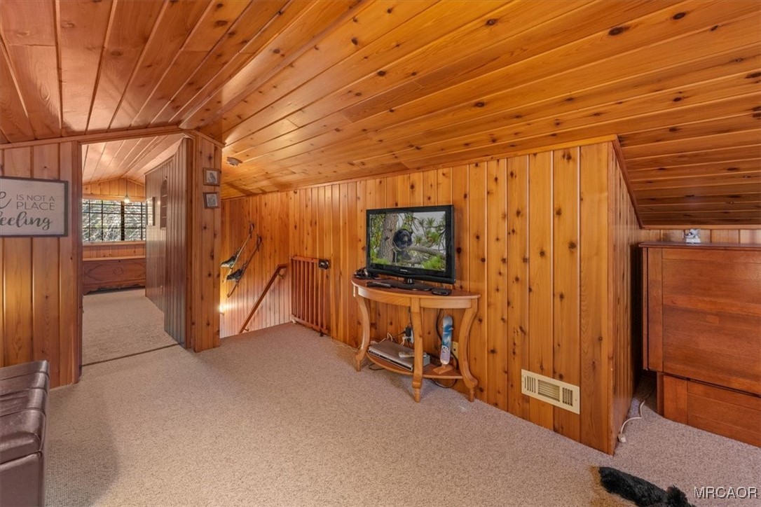 446 Moreno Lane Sugarloaf, CA 92386 - Photo 30 of 41 a view of a room with furniture and a flat screen tv