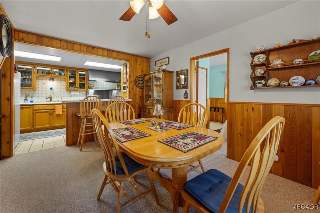 446 Moreno Lane Sugarloaf, CA 92386 - Photo 9 of 41 a view of a dining room with furniture and chandelier