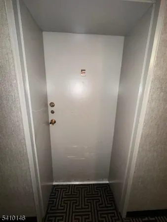 a view of a livingroom with furniture and a fireplace