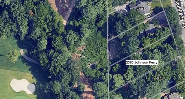 a sign that is sitting in a tree