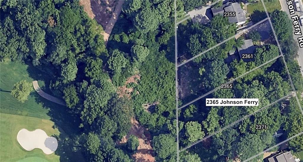 a sign that is sitting in a tree