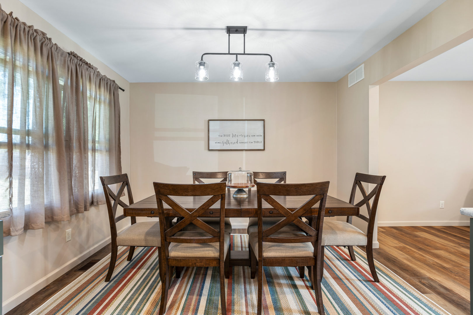 24 Crestview Court Fisher, IL 61843 - Photo 11 of 42 a view of a dining room with furniture window and wooden floor