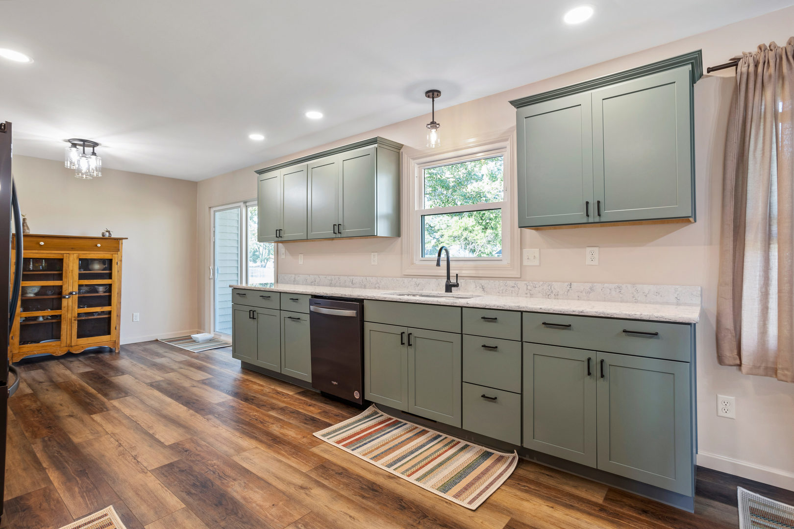 24 Crestview Court Fisher, IL 61843 - Photo 15 of 42 a kitchen with stainless steel appliances granite countertop a sink and cabinets