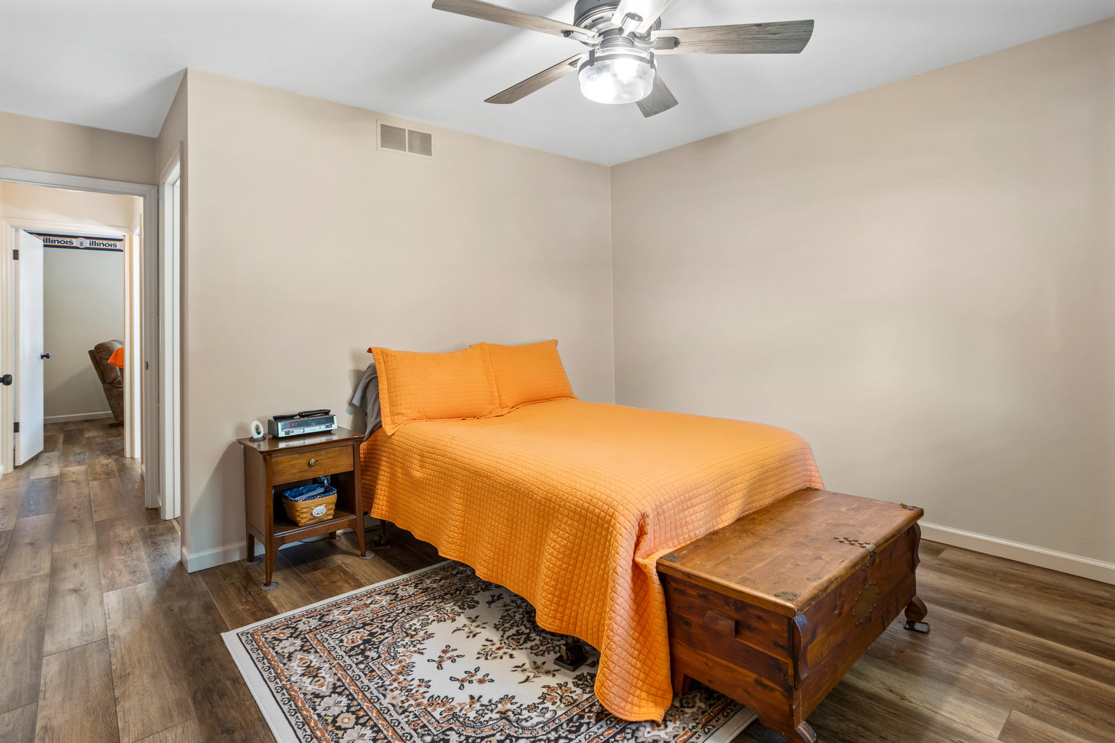 24 Crestview Court Fisher, IL 61843 - Photo 17 of 42 a bedroom with a bed and wooden floor