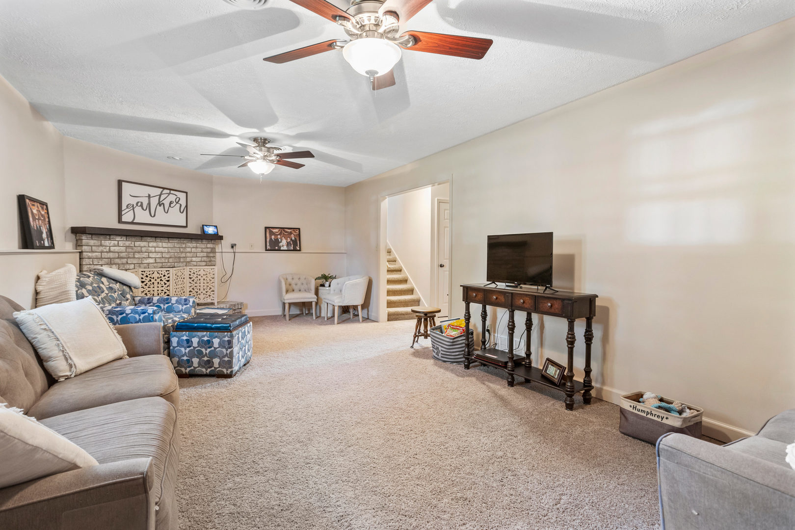 24 Crestview Court Fisher, IL 61843 - Photo 29 of 42 a living room with furniture and a flat screen tv