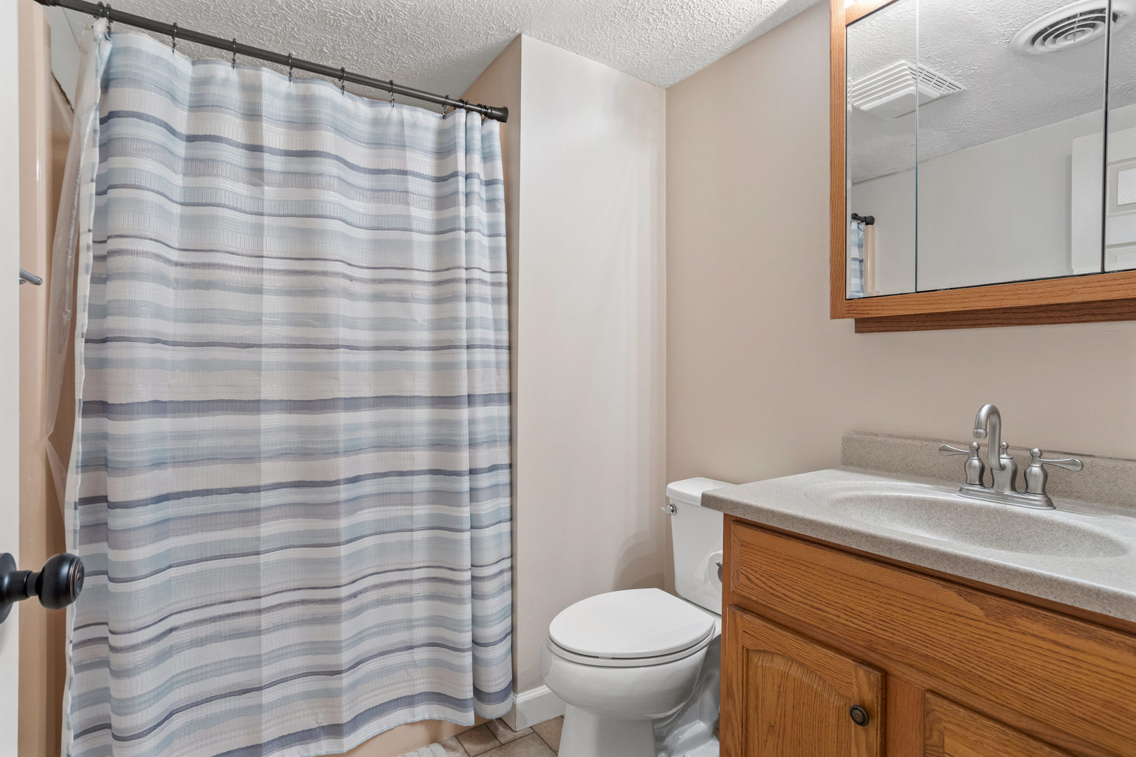 24 Crestview Court Fisher, IL 61843 - Photo 30 of 42 a bathroom with a sink a toilet and a mirror