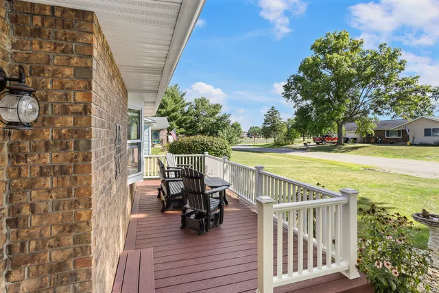 a view of balcony with outdoor seating and stairs