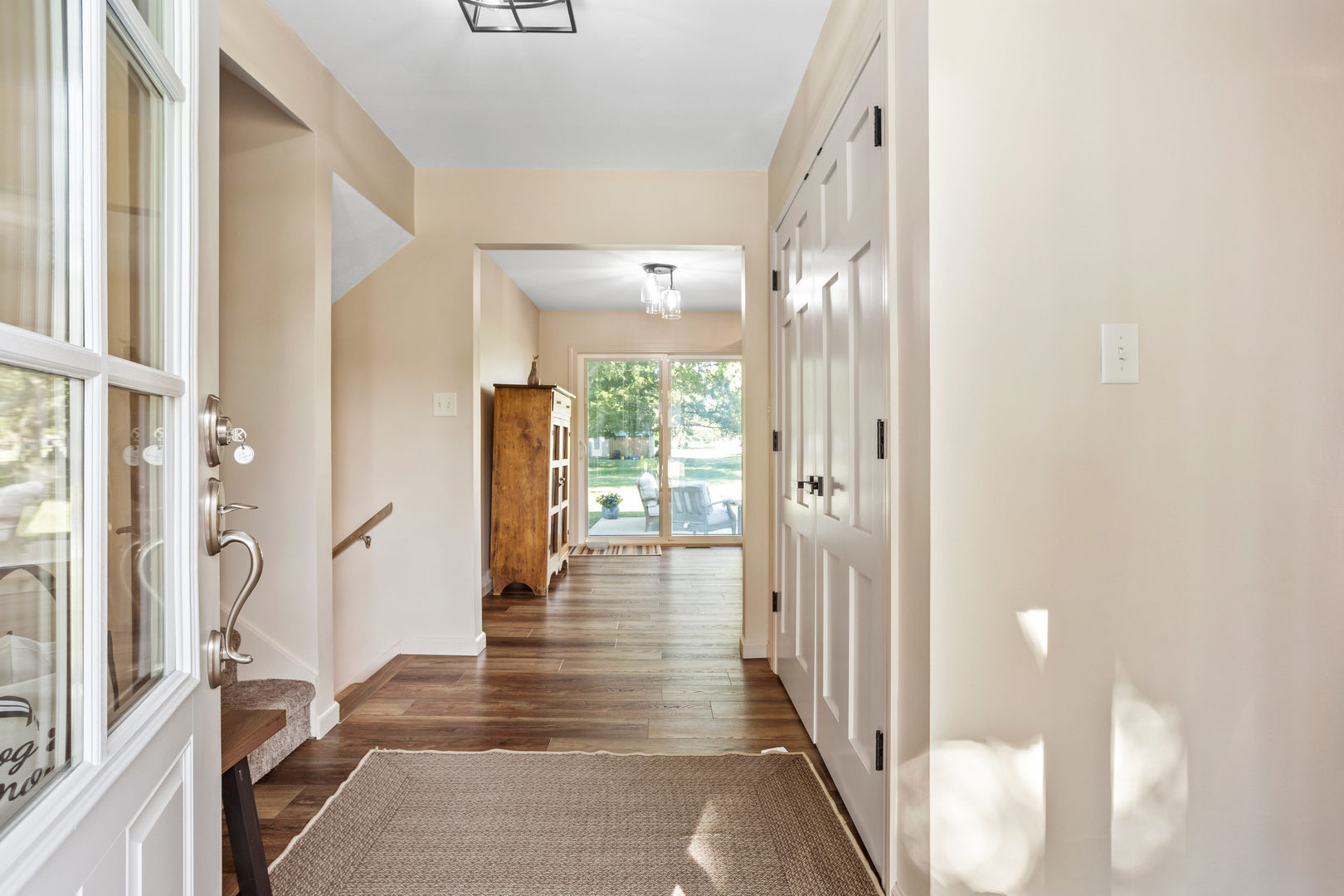 24 Crestview Court Fisher, IL 61843 - Photo 5 of 42 a view of a hallway with wooden floor and staircase