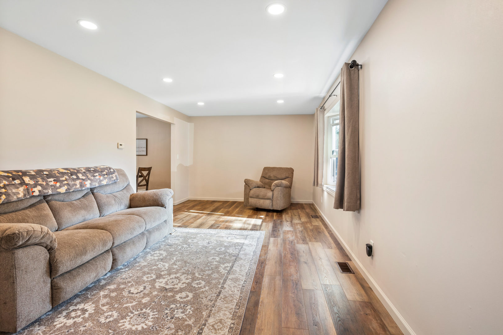 24 Crestview Court Fisher, IL 61843 - Photo 7 of 42 a living room with furniture and a couch