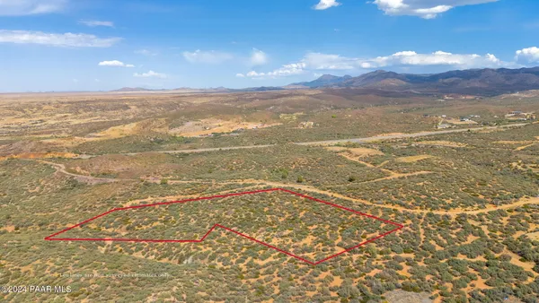 a view of an ocean and mountain