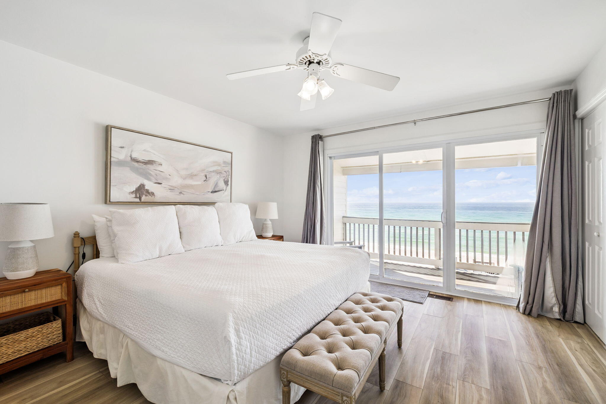 8116 East County Highway 30A, Unit 5 Inlet Beach, FL 32461 - Photo 20 of 48 a bedroom with a large bed and a large window
