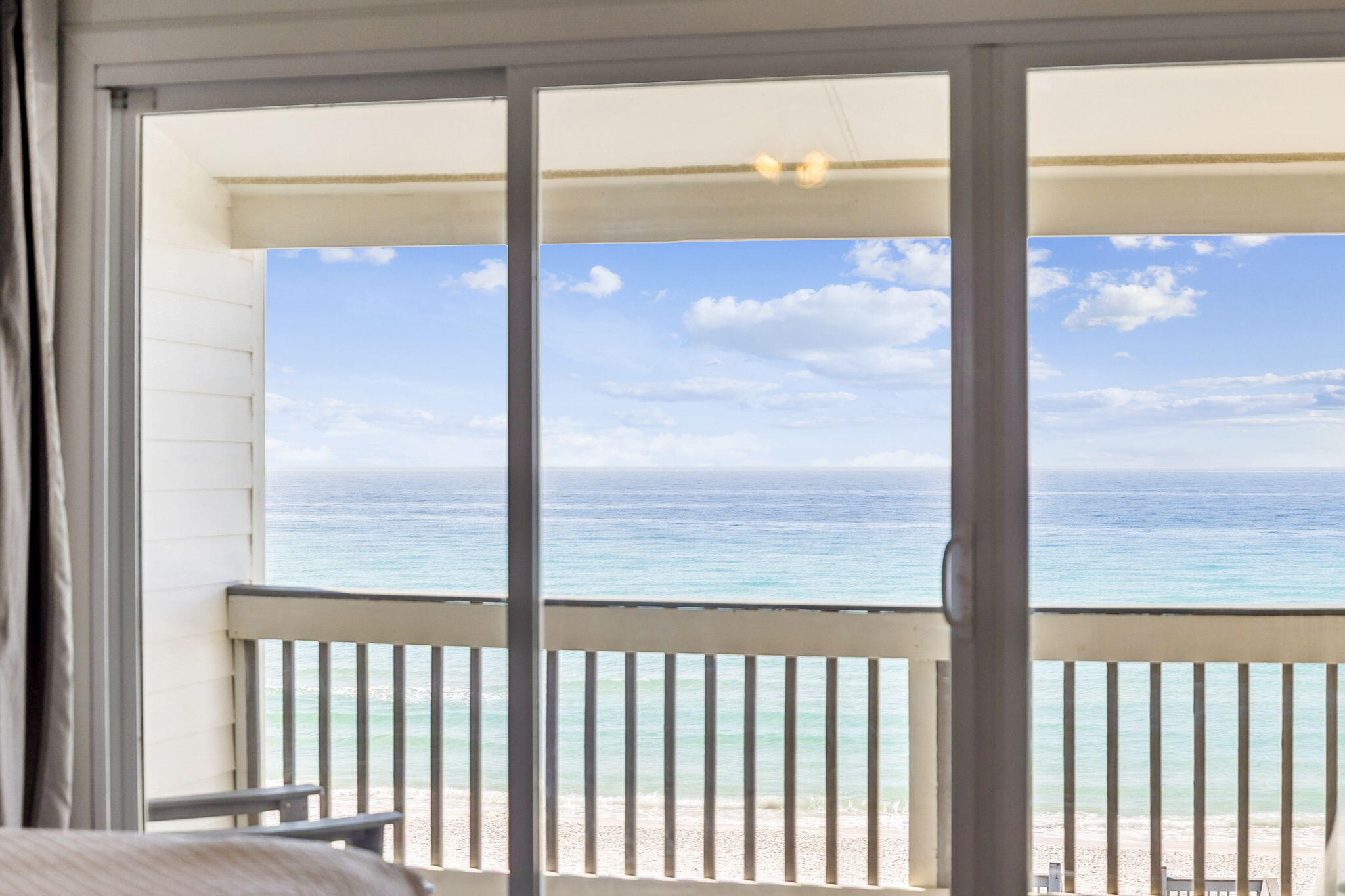 8116 East County Highway 30A, Unit 5 Inlet Beach, FL 32461 - Photo 21 of 48 a view of a glass door of the house