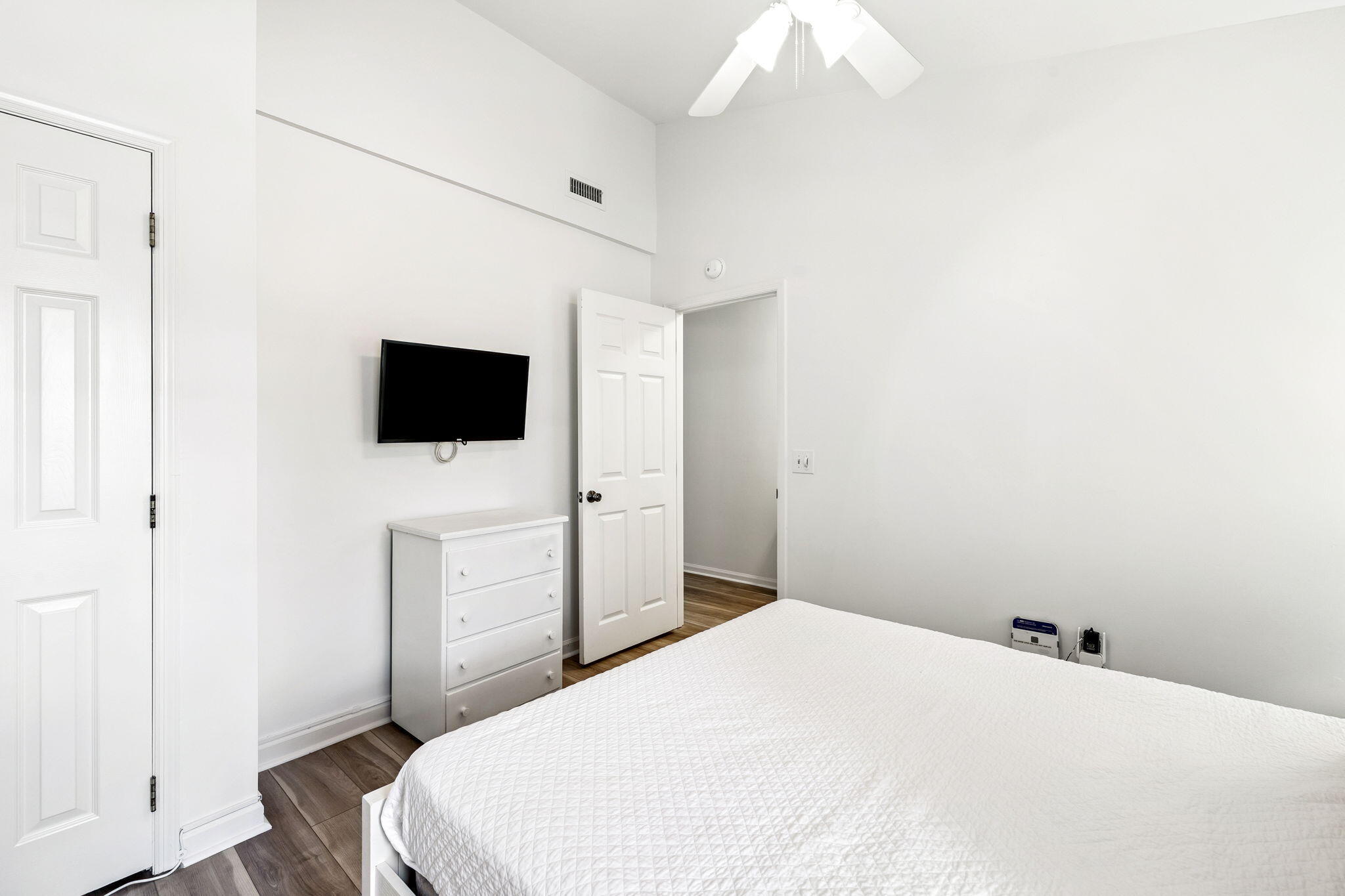 8116 East County Highway 30A, Unit 5 Inlet Beach, FL 32461 - Photo 26 of 48 a bedroom with a bed and a flat screen tv