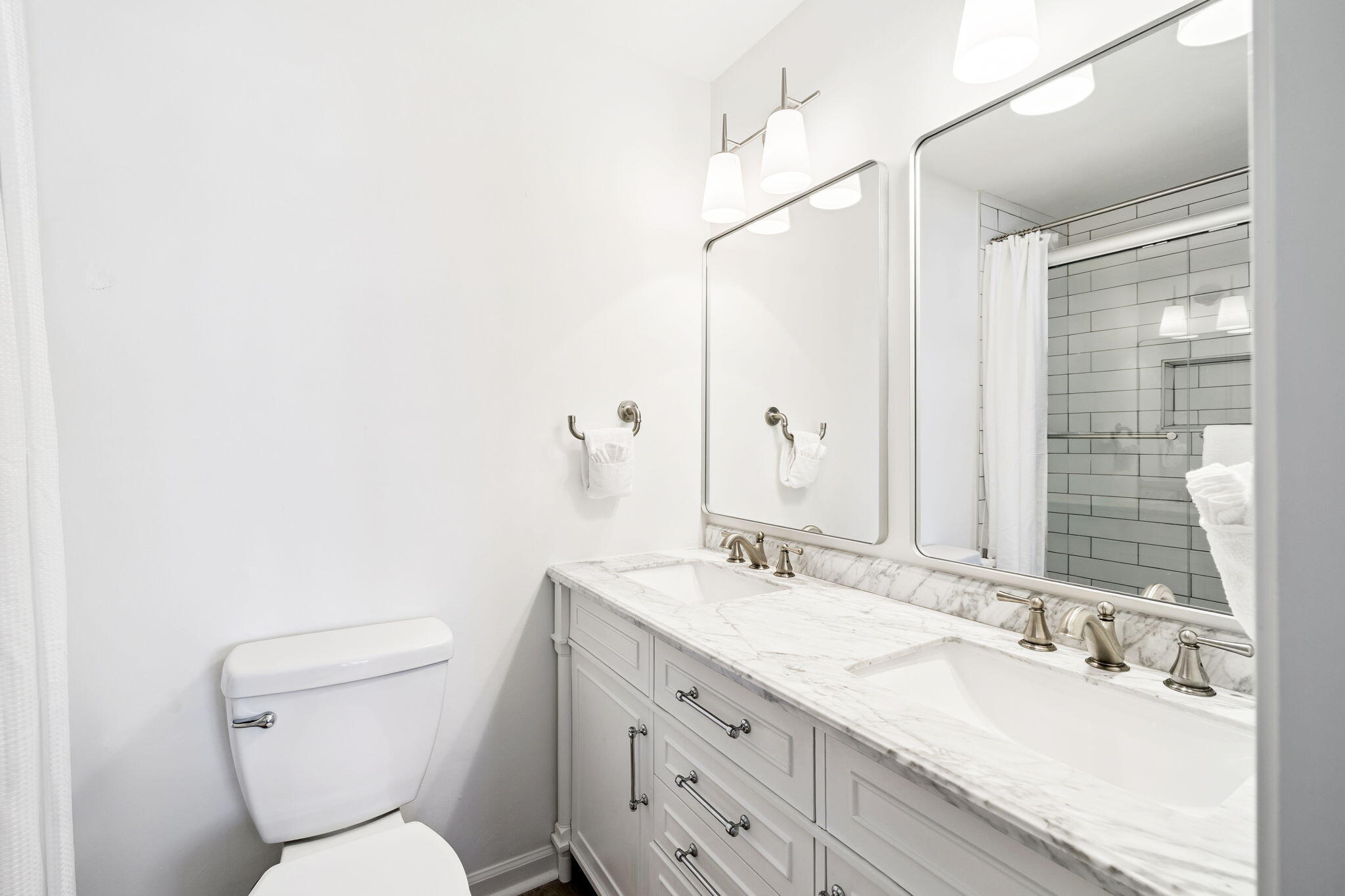 8116 East County Highway 30A, Unit 5 Inlet Beach, FL 32461 - Photo 28 of 48 a bathroom with a granite countertop sink mirror vanity and toilet