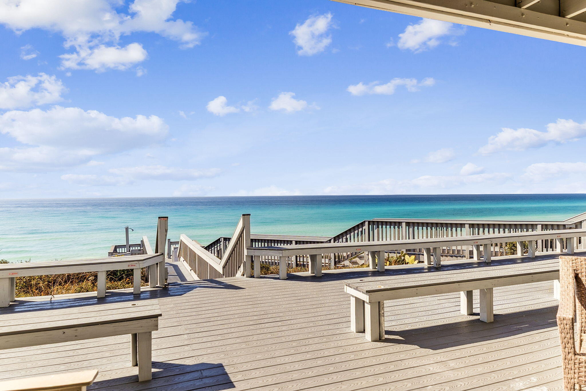 8116 East County Highway 30A, Unit 5 Inlet Beach, FL 32461 - Photo 33 of 48 a roof deck with a table and chairs