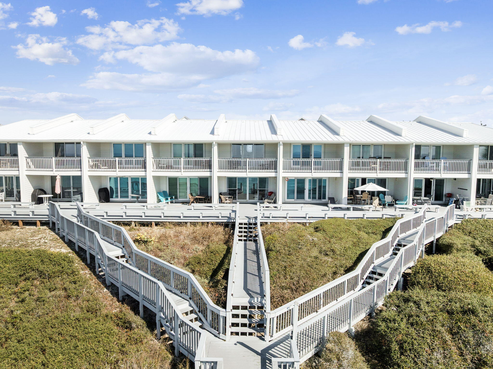 8116 East County Highway 30A, Unit 5 Inlet Beach, FL 32461 - Photo 40 of 48 a view of a swimming pool with a patio