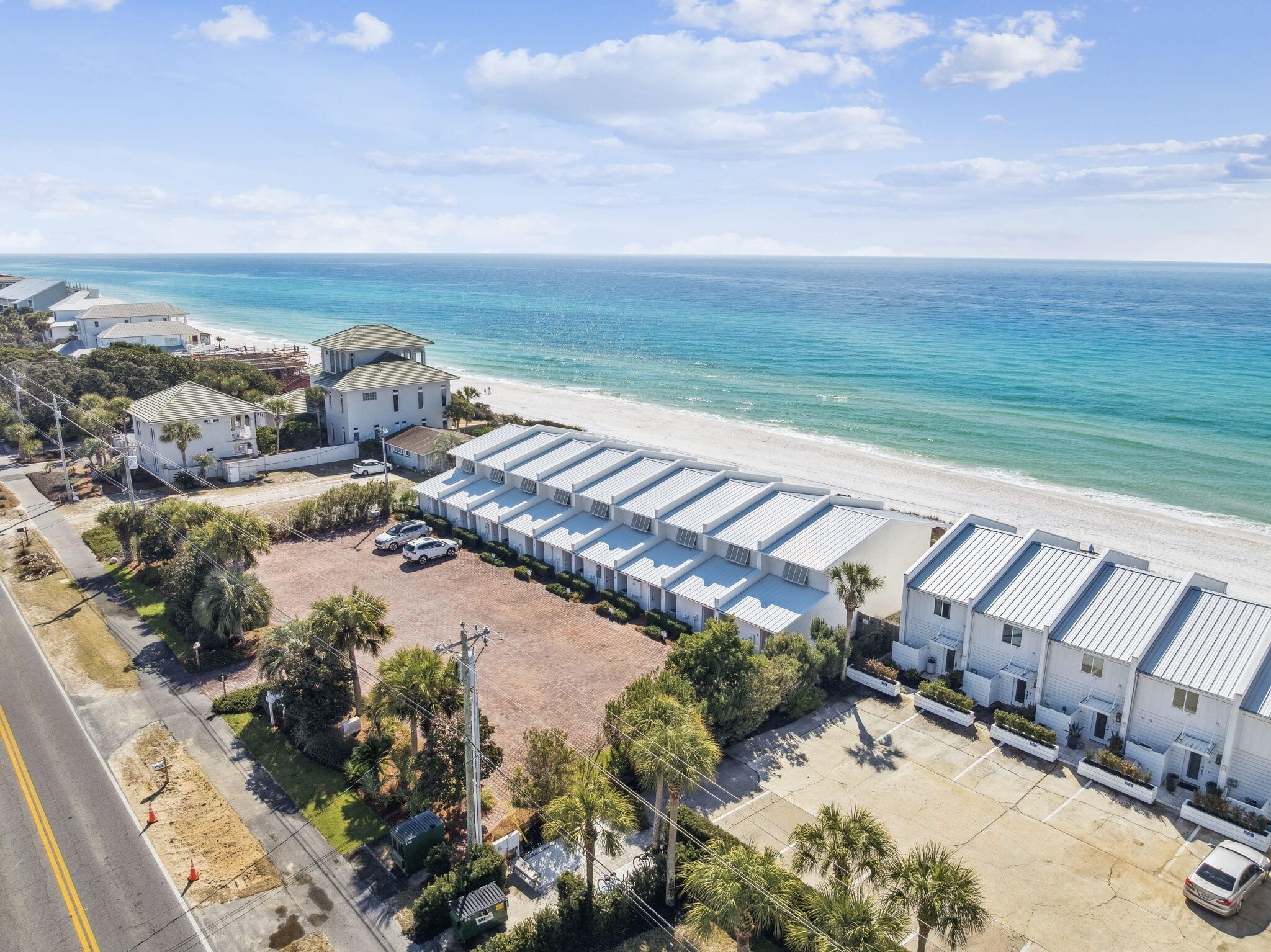 8116 East County Highway 30A, Unit 5 Inlet Beach, FL 32461 - Photo 42 of 48 a view of a terrace with a garden