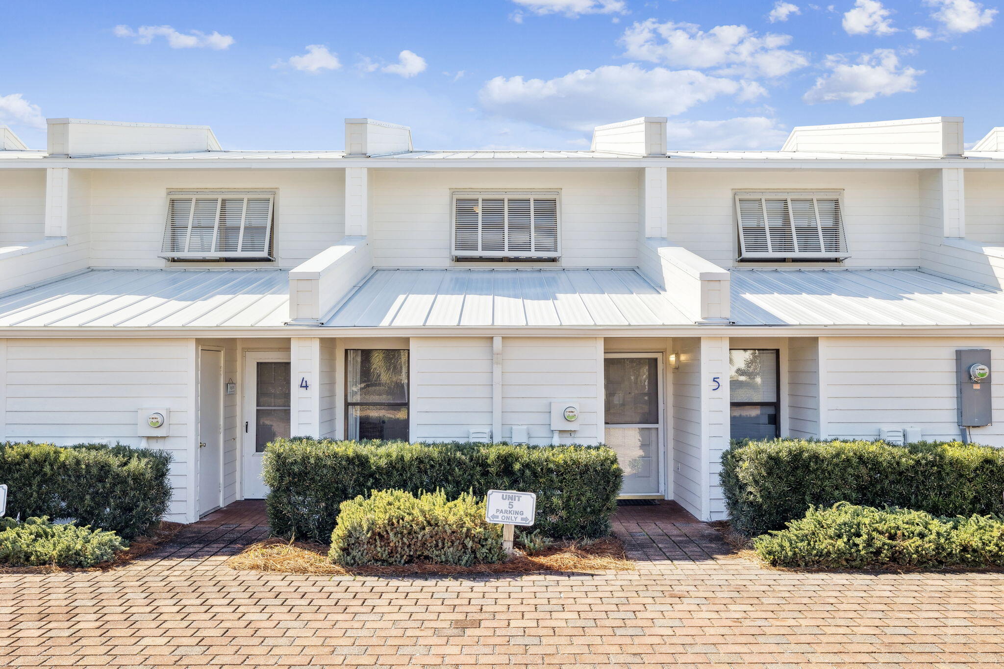 8116 East County Highway 30A, Unit 5 Inlet Beach, FL 32461 - Photo 48 of 48 a front view of a house with a yard