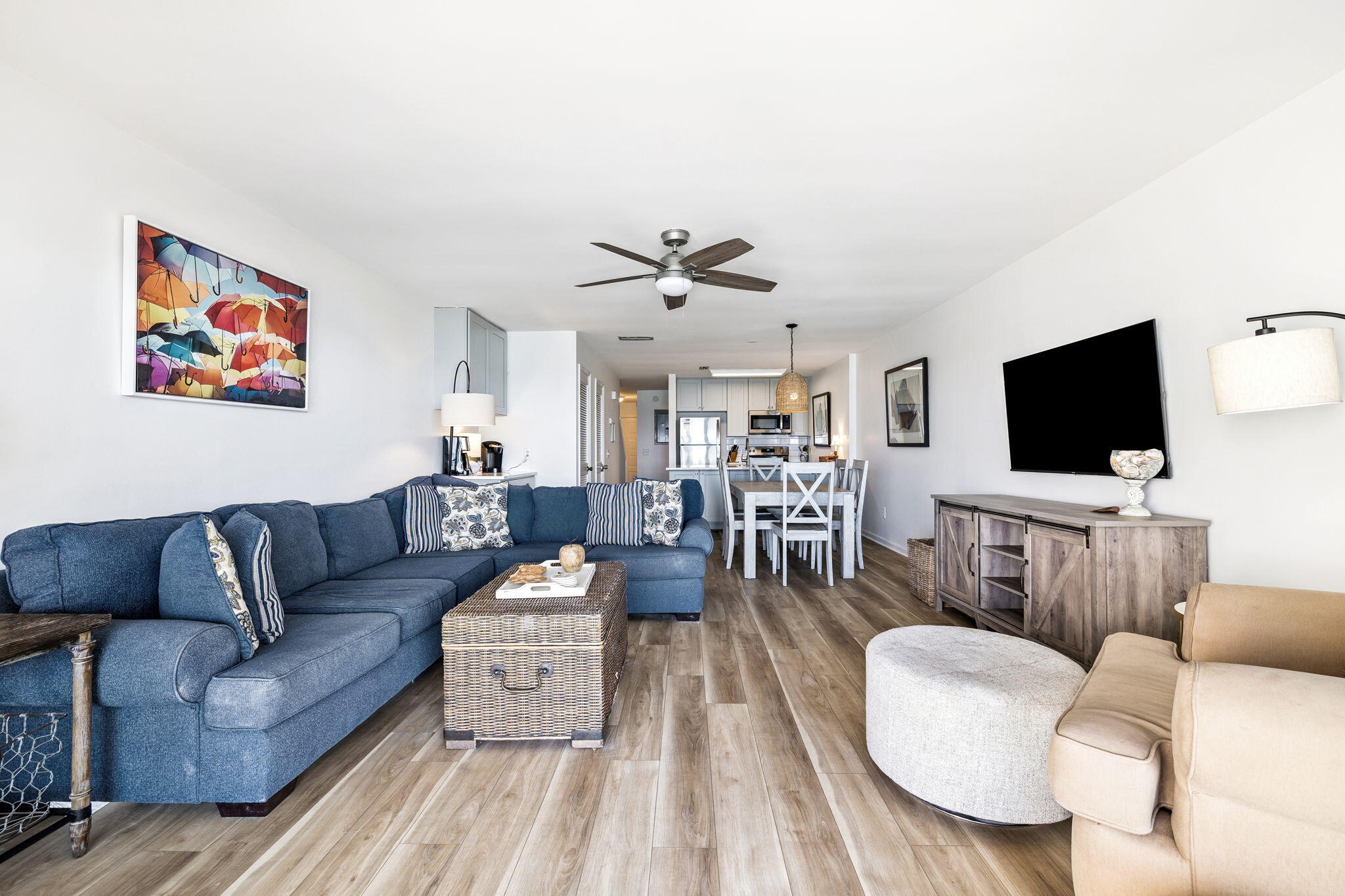 8116 East County Highway 30A, Unit 5 Inlet Beach, FL 32461 - Photo 7 of 48 a living room with furniture and a flat screen tv