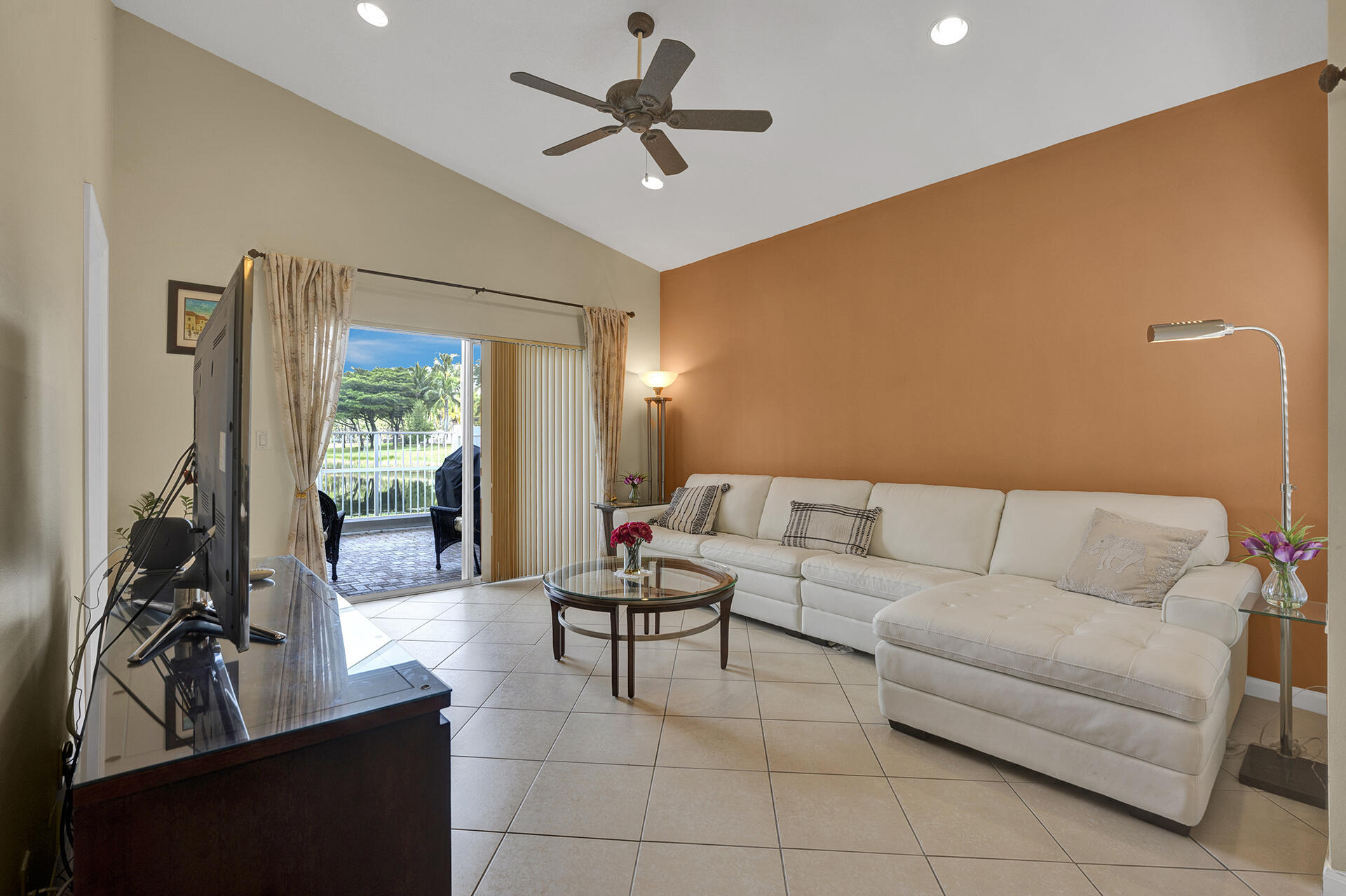 5803 Raceway Road Lake Worth, FL 33449 - Photo 13 of 49 a living room with furniture and a large window