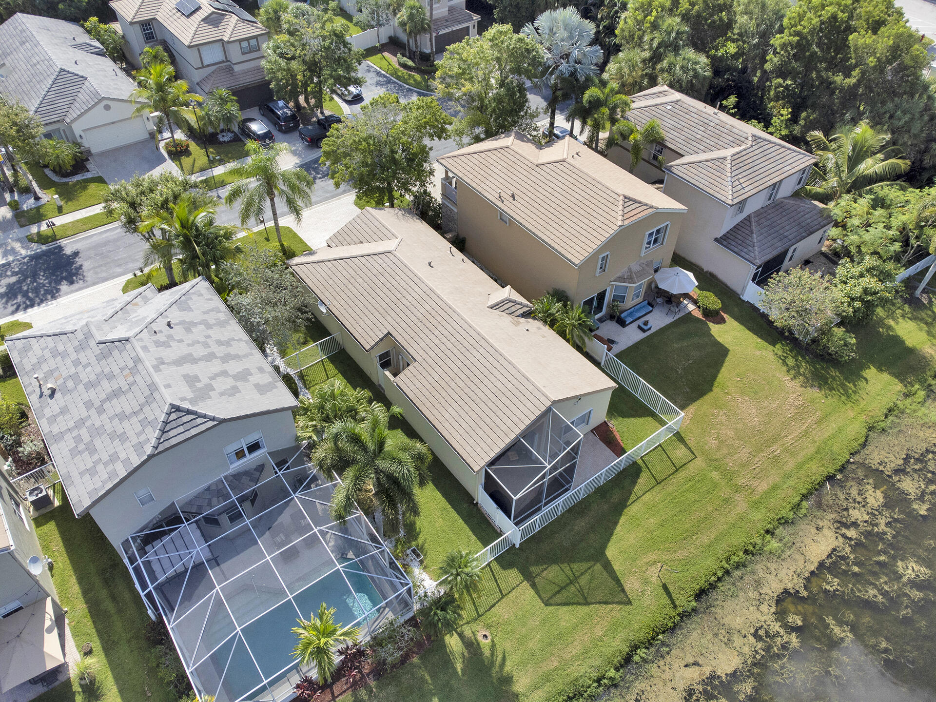 5803 Raceway Road Lake Worth, FL 33449 - Photo 39 of 49 an aerial view of a house with swimming pool and outdoor seating