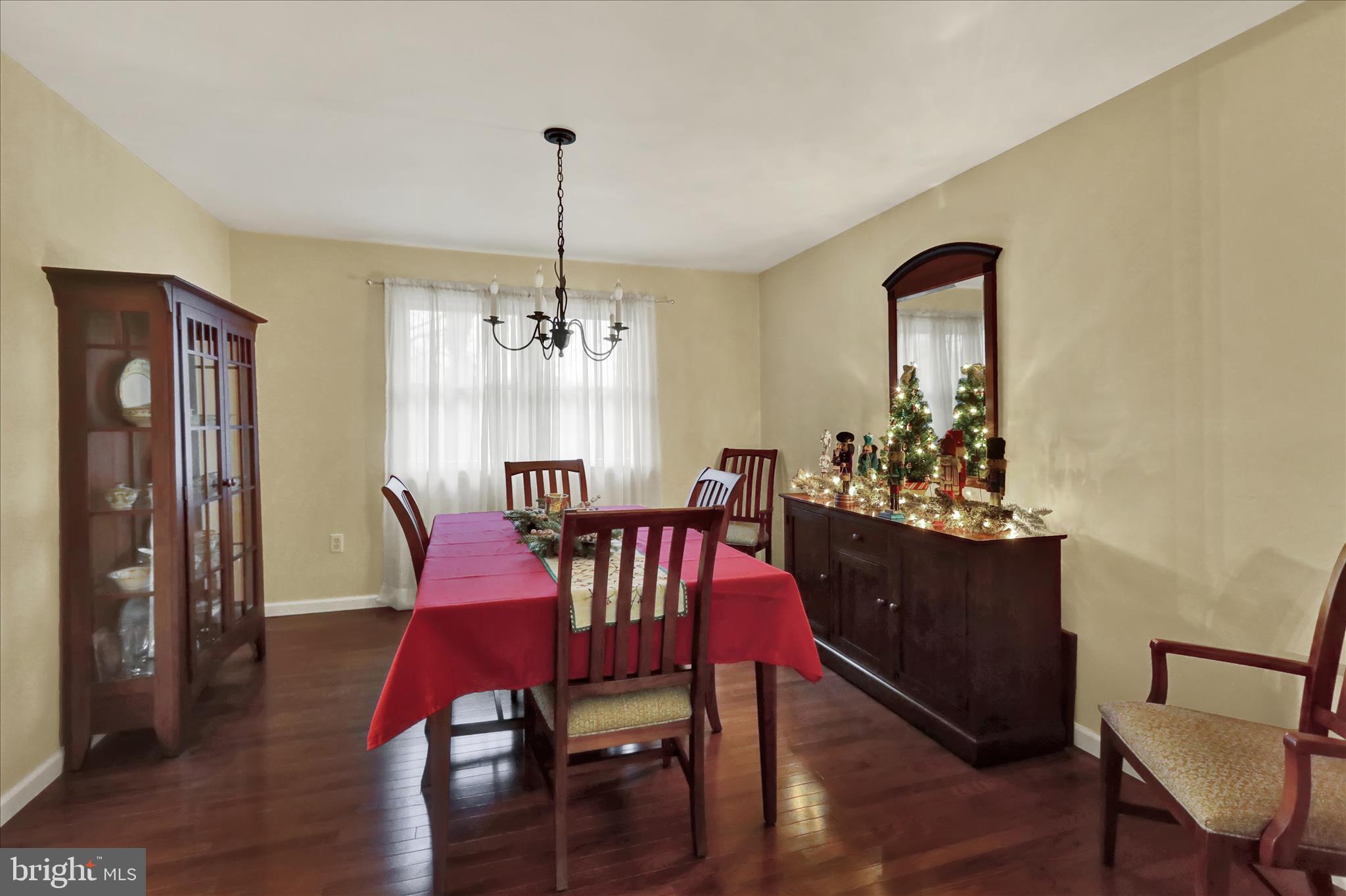 314 Fairview Road Reading, PA 19606 - Photo 17 of 45 a view of a dining room with furniture window and wooden floor
