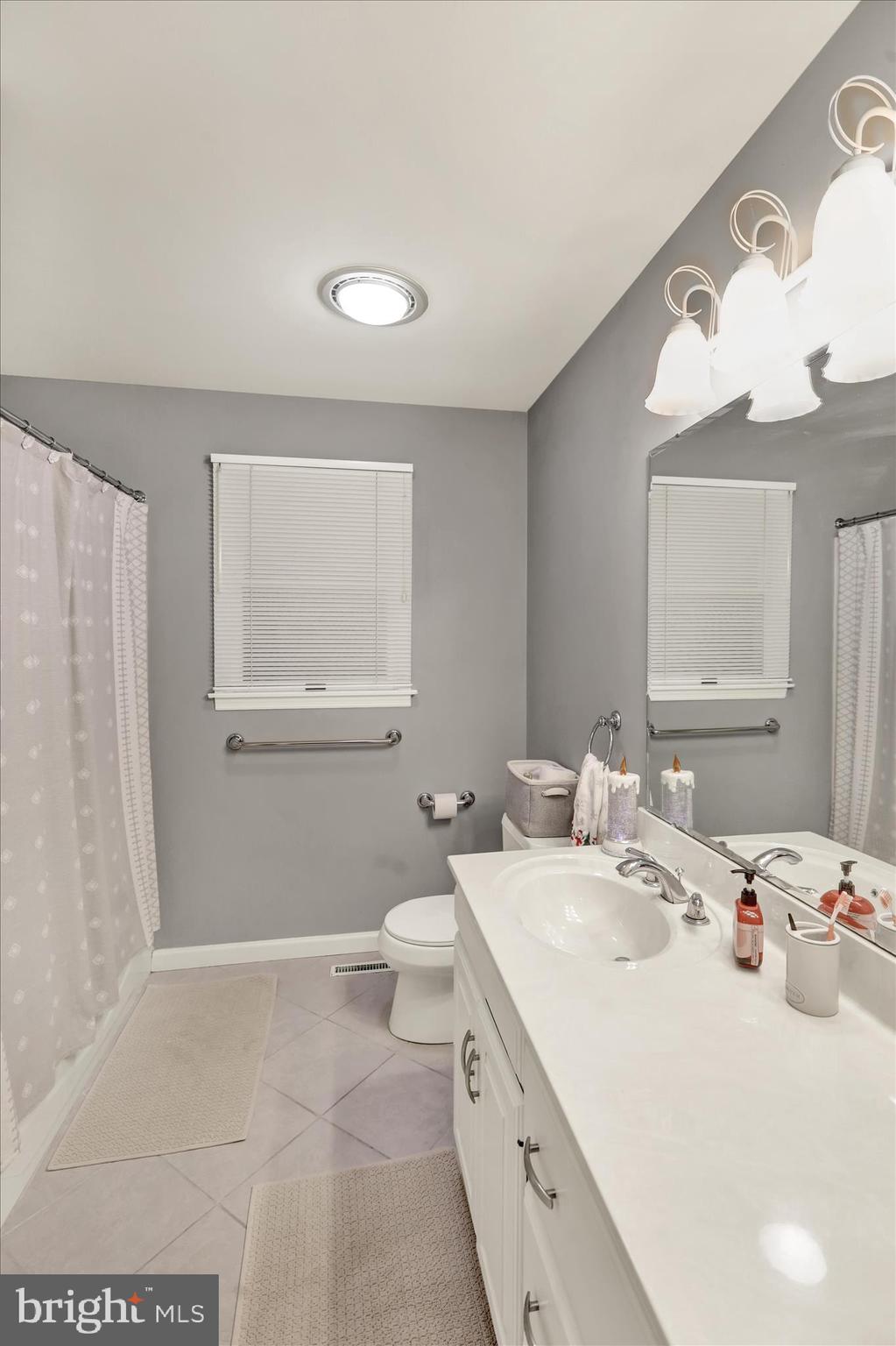 314 Fairview Road Reading, PA 19606 - Photo 28 of 45 a bathroom with a sink a toilet and mirror